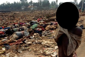 File photo of a Rwandan boy covering his face from the stench of dead bodies